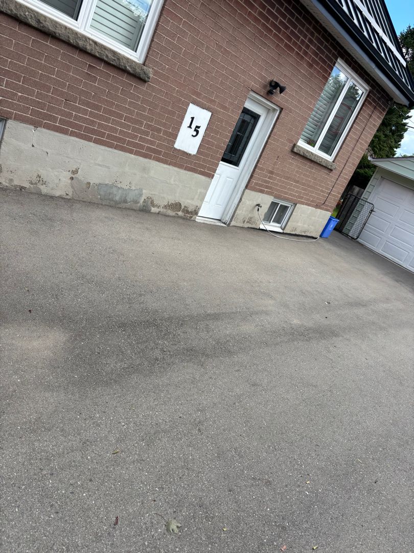 Before parging - damaged and deteriorated foundation coating